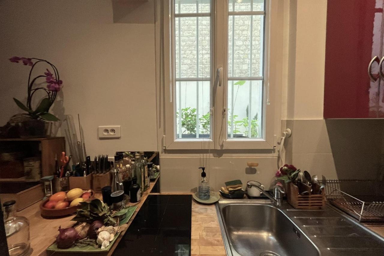 Charming Apartment In The Heart Of Париж Екстериор снимка